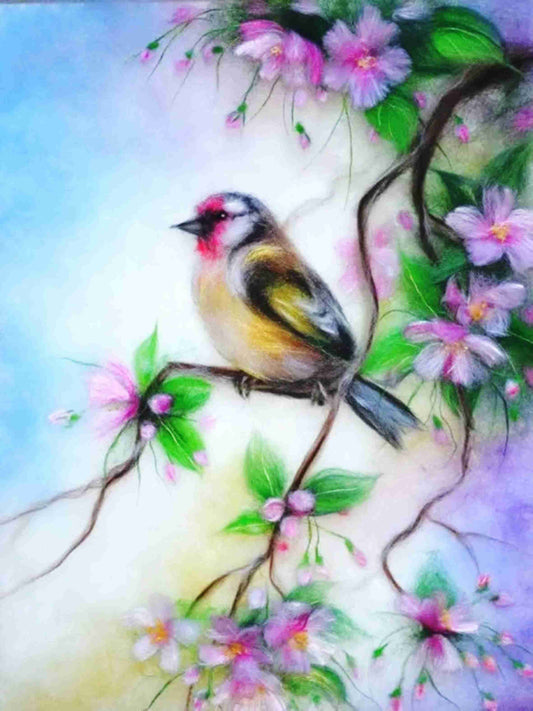 Bird sitting on tree branch